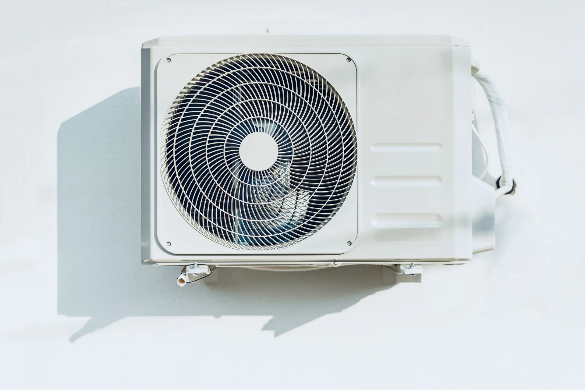 Avif new outside air conditioner unit hanging on white 2025 02 25 06 26 17 utc.jpg